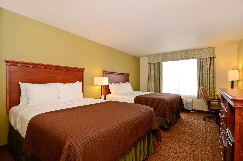 Heritage Hotel And Suites Dickinson Quarto foto